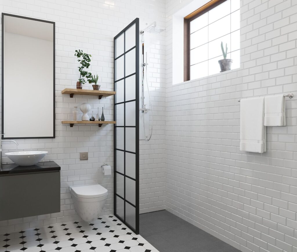 White bathroom with toilet sink and towel